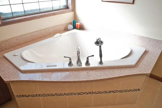 granite kitchen countertops with elegant tile backsplash